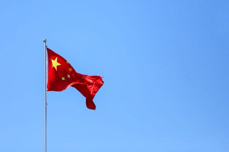 chinese-flag-waving-against-clear-blue-sky-2022-08-01-01-16-28-utc